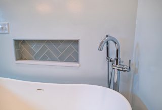 Herringbone tile in contemporary bathroom remodeling in Champaign Urbana
