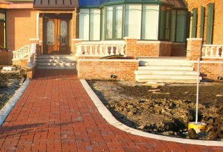 Brick path to solarium home addition to historic mansion in East Central Illinois