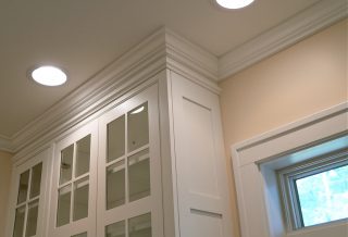 Crown moulding in remodeled galley kitchen in Champaign