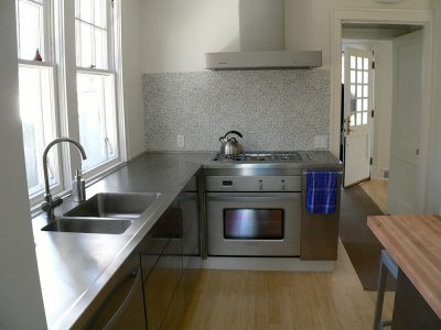Stainless steel range and hood in kitchen remodel in Champaign