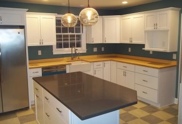 Recycled paper island countertop in an eco-friendly kitchen remodel in Champaign IL.