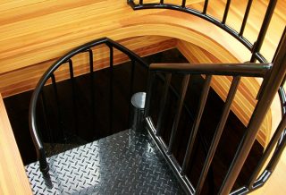Spiral staircase leadin to cupola in historic restored Victorian farmhouse in East Central IL
