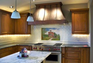 Remodeled kitchen with brass range in historic restoration of Victorian farmhouse in East Central IL