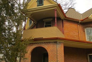 New balcony and gable window on award-winning historic preservation construction project