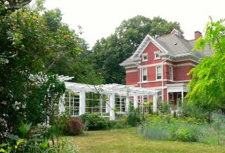 Pergola construction with historic Wilber Mansion