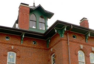 Exterior of cupola and roof detail on historic restored Victorian farmhouse in East Central IL