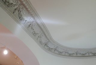 Repaired curved grape plaster mouldings, Historic restoration of Orpheum Children's Science Museum in Champaign IL