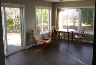 Sitting room with patio door in home addition project in Urbana IL