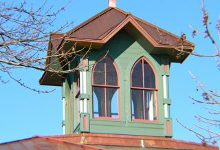 Exterior of rebuilt cupola on historic restored Victorian farmhouse in East Central IL