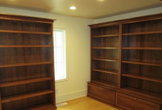 Home library addition with finished bookcases
