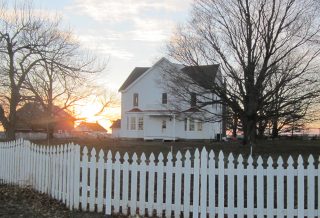Energy efficient exterior restoration of an historic farmstead in Mahomet, IL.
