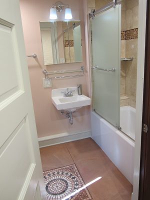 Basement Bathroom remodel with Floor Medallion in Urbana IL.