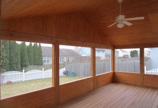 Patio and porch construction project including Cathedral ceilings, composite decking, lighting and ceiling fans.