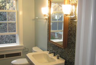 Medicine cabinet and lighting in bathroom remodel project in West Urbana, IL.