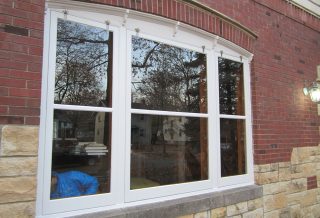Preservation of original windows often includes rebuilding the deteriorating wood storm windows.