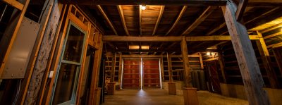 Timber frame barn restoration project by New Prairie Construction