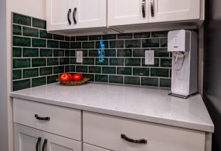 Counters and subway tile in Kitchen remodel and upgrade in Urbana IL, by general contractor New Prairie Construction Co.