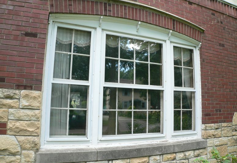 Preservation of original windows often includes rebuilding the deteriorating wood storm windows.