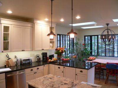 Pendant lights, kitchen and dining area of 1927 Spanish Colonial Revival home addition in Urbana IL